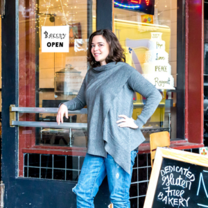 Amanda in front of a bakery